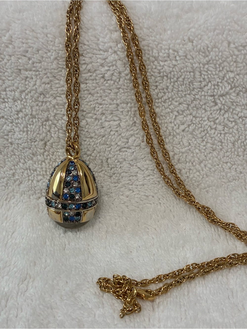 Vintage Fabergé-style egg pendant watch, likely from the brand Main Line Time